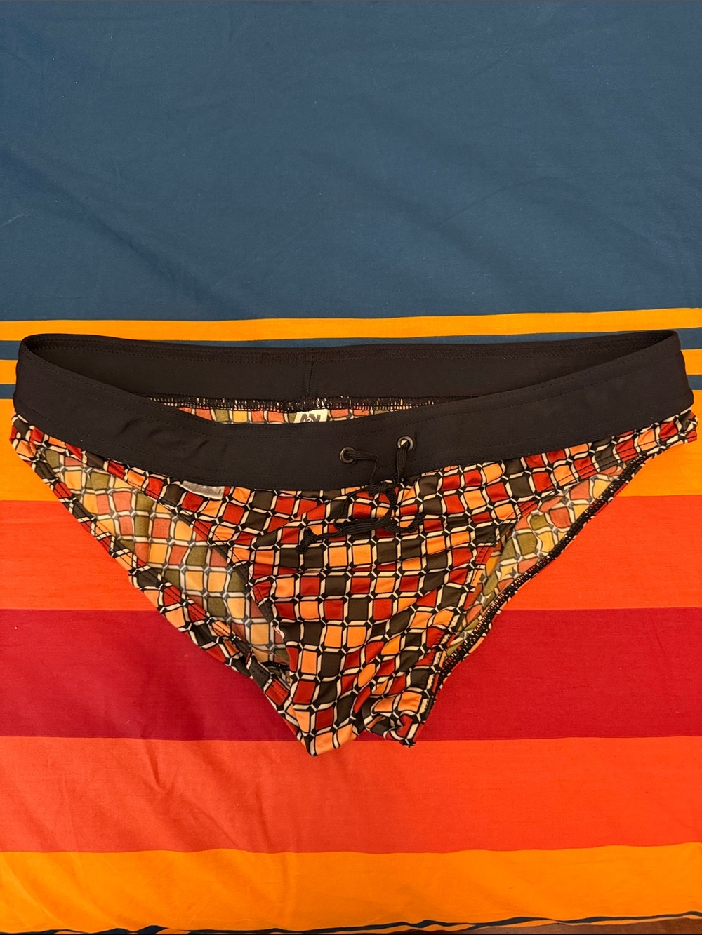 N2N vintage Geometric Print Swim Briefs in Black, Orange, Red